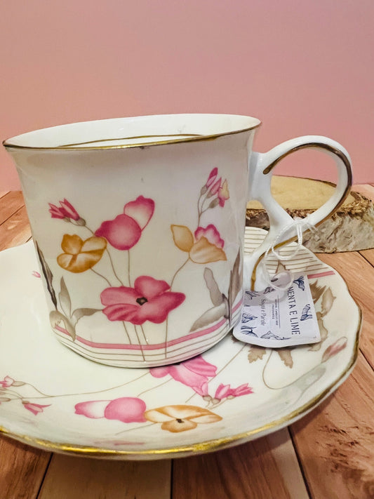 Candela in tazza vintage inglese con fiorellini rosa e gialli